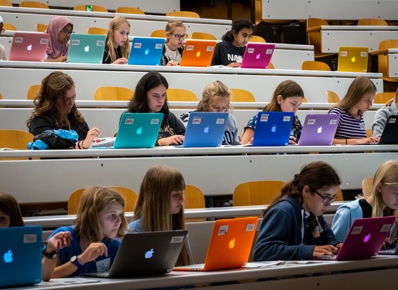  Colourful MacBooks in a university course