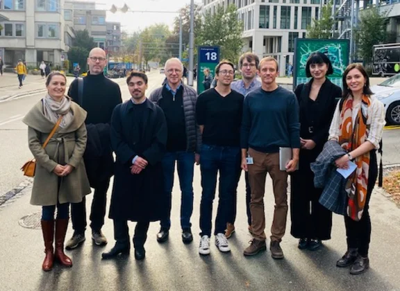 Group of people in front of a modern building