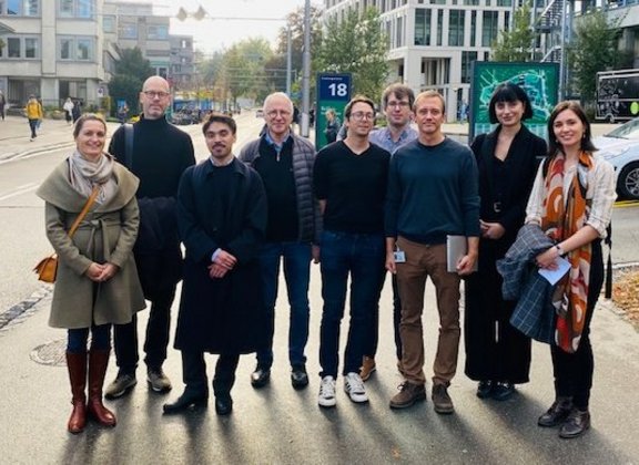 Group of people in front of a modern building