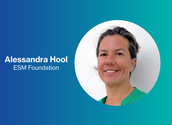 Alessa Hool in green clothing against a blue background