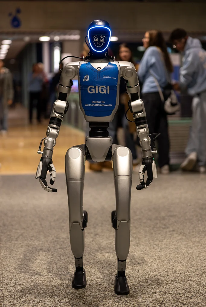 Humanoid robot with a glowing face in a corridor