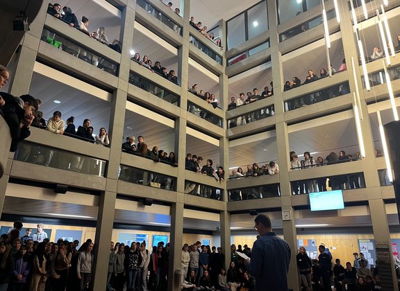 Multi-storey atrium full of spectators